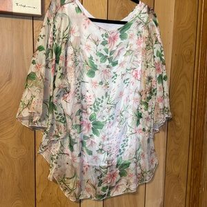 White floral top new never been worn just bought in Italy in sept! Lg to XL